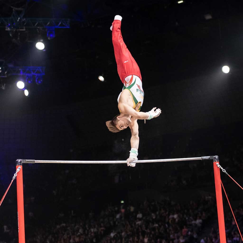 Gymnova FIG Montreal high bar with safety hand-rail